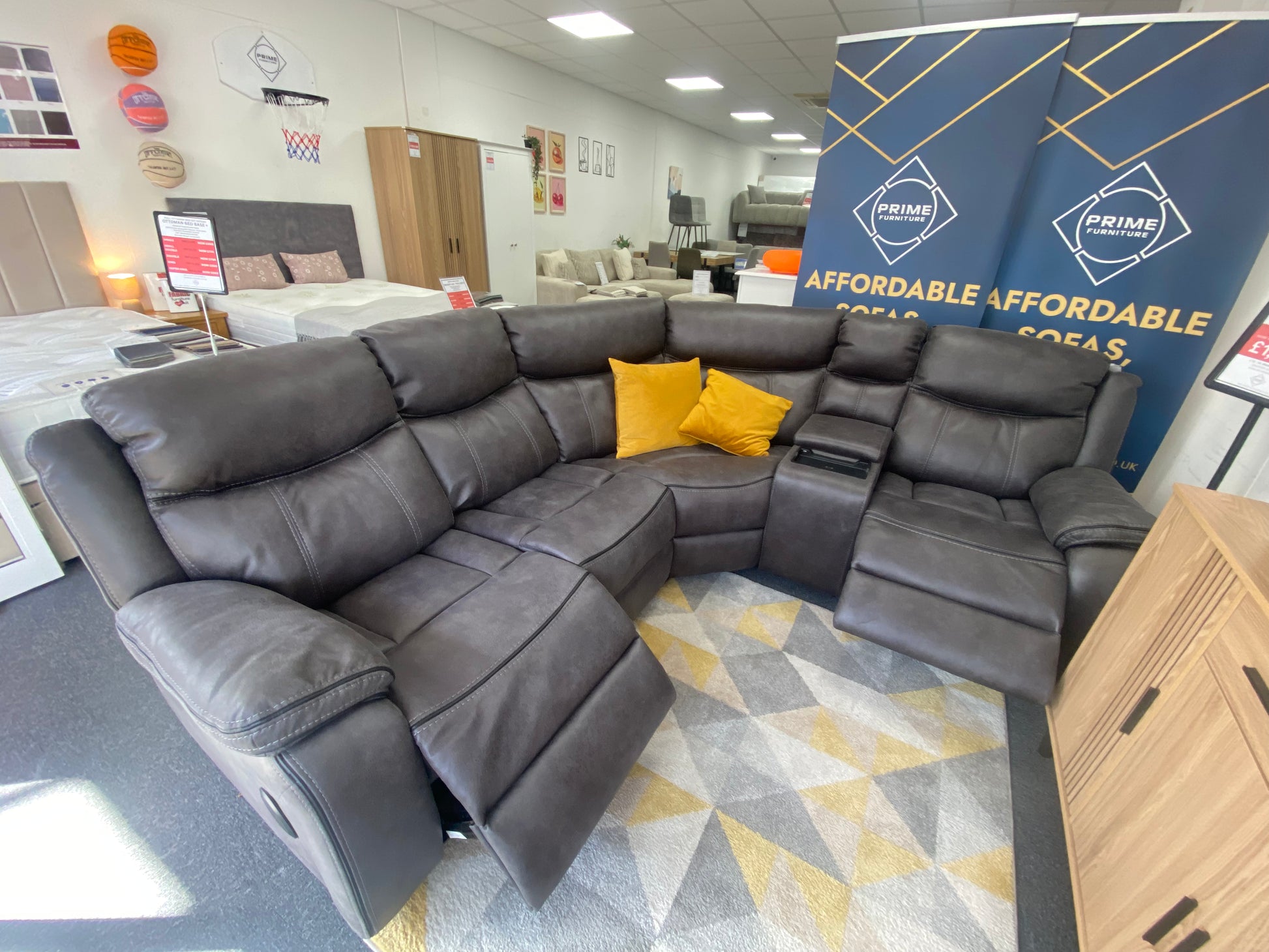 Lotus L-shaped corner power recliner sofa with console, showroom view