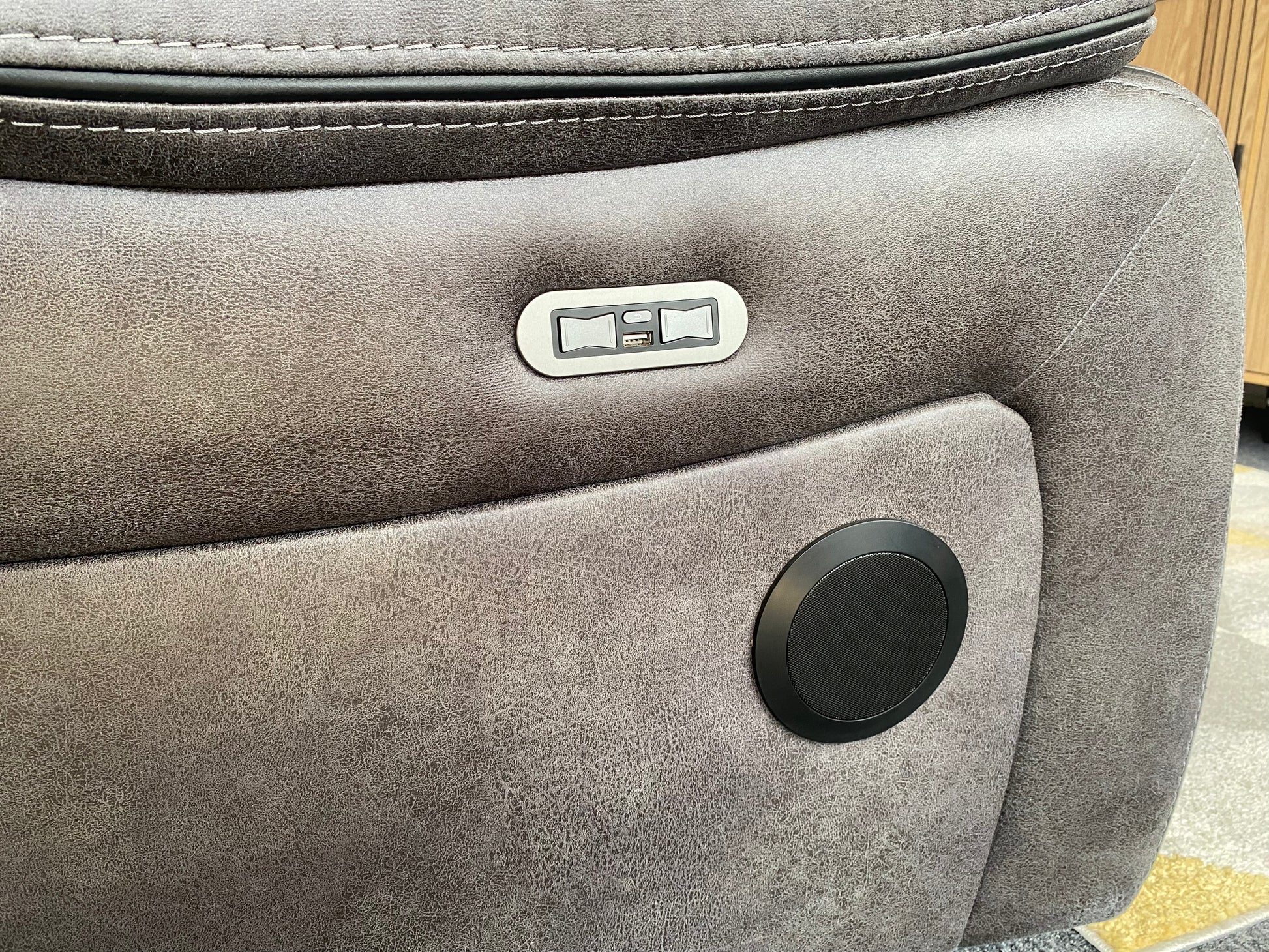 Lotus modular power recliner in grey faux suede, close-up detail