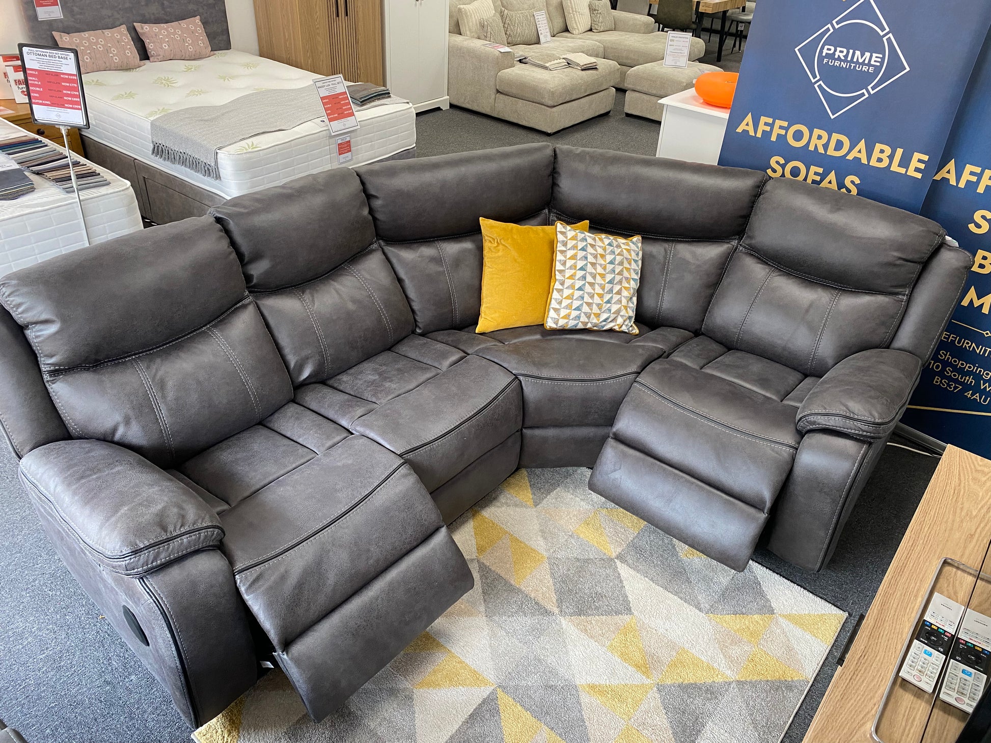 Lotus L-shaped corner power recliner sofa without console, showroom view